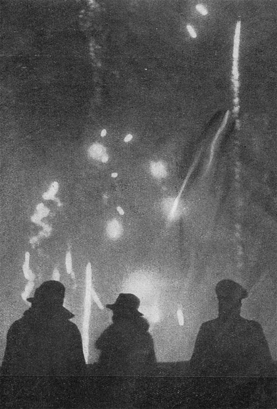 Adolf Hitler (far right) watches the new year's fireworks on the Berchtesgadener land